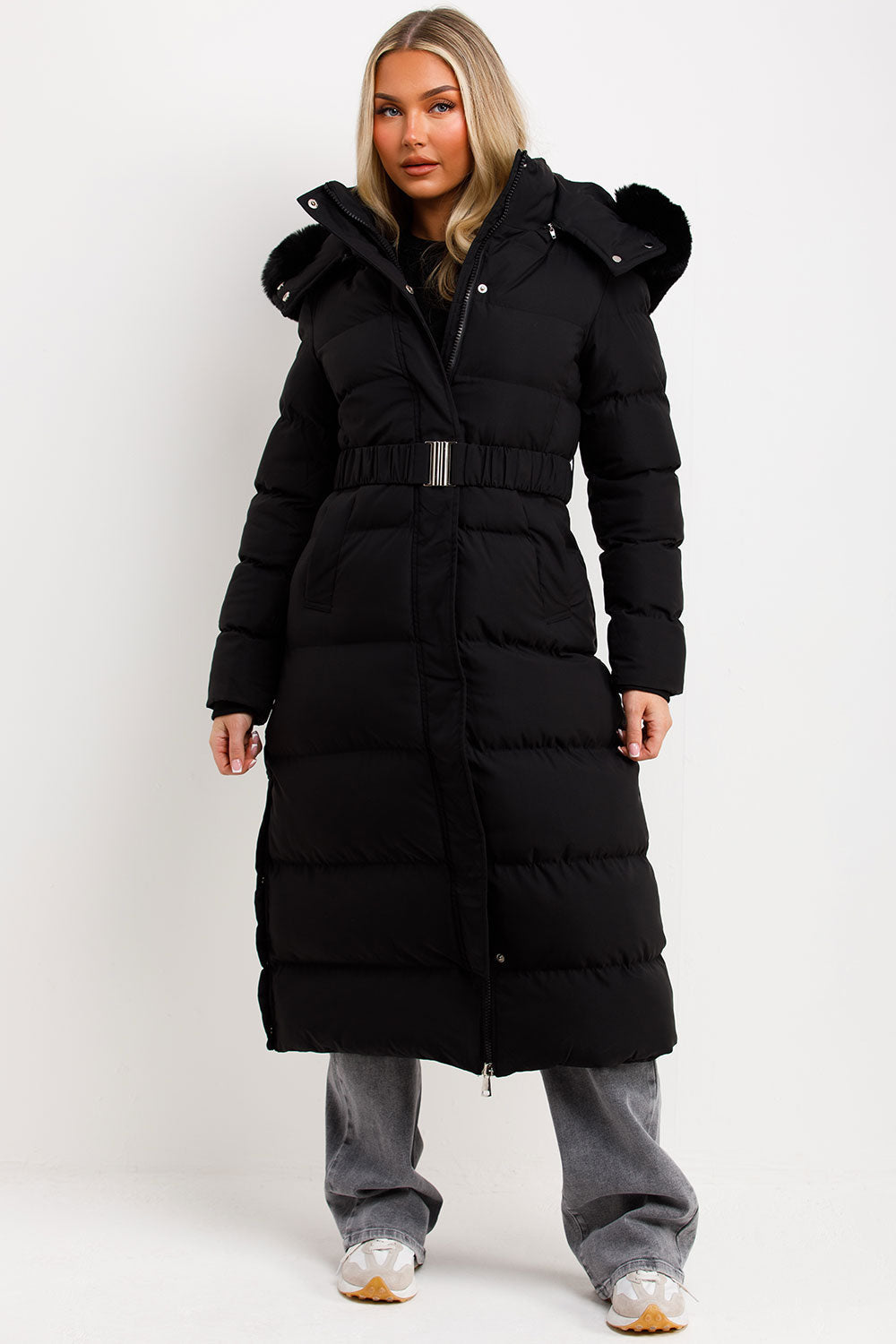 Reeva | Women’s long puffer coat with faux fur hood and belt