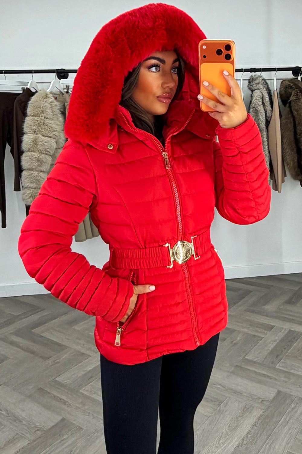 Eleanore | Women’s belted puffer jacket with faux fur hood
