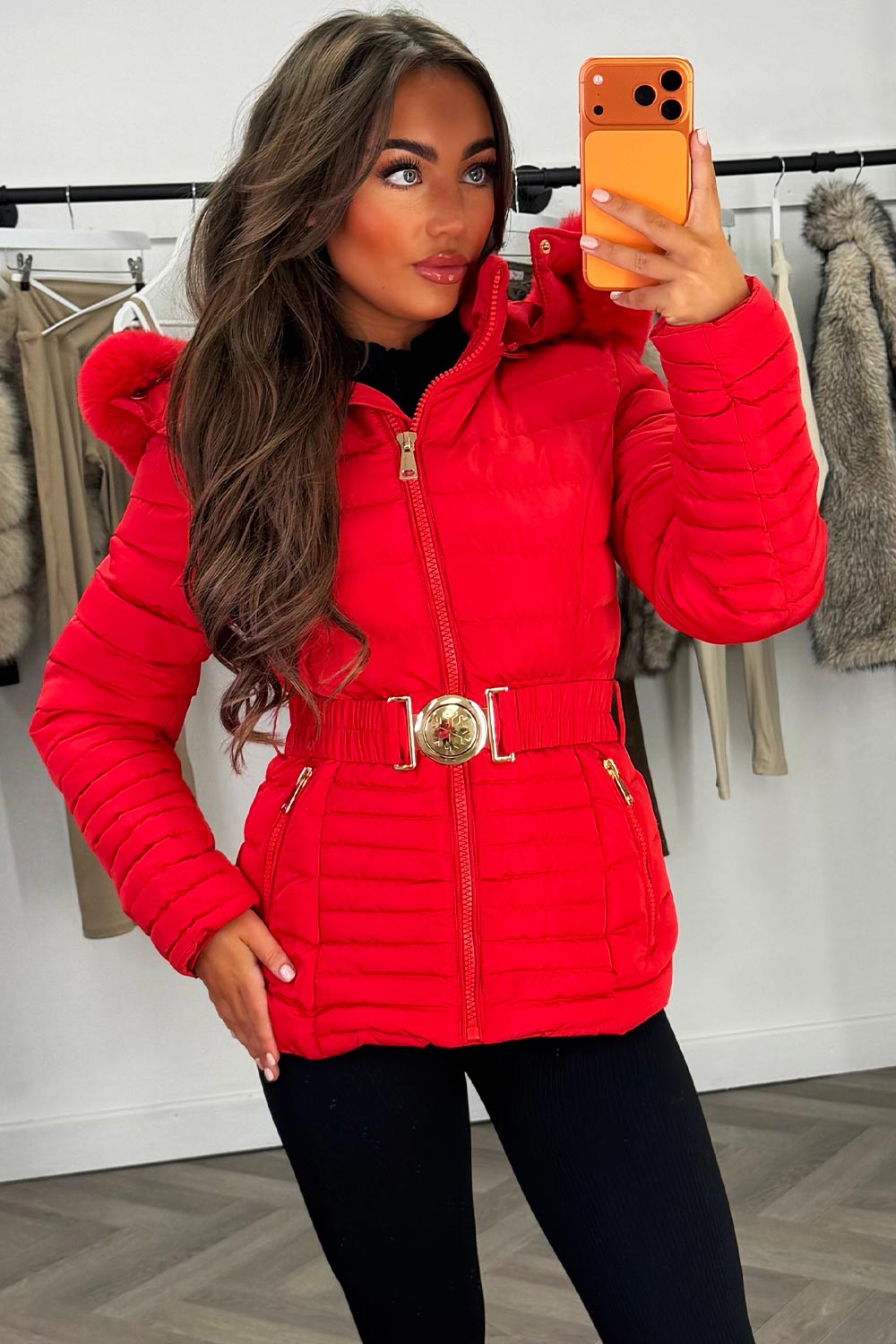 Eleanore | Women’s belted puffer jacket with faux fur hood