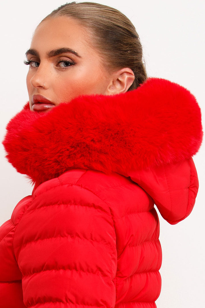 Eleanore | Women’s belted puffer jacket with faux fur hood