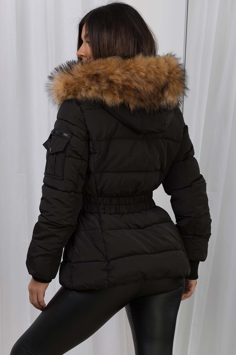 Ameliee | Women’s belted puffer jacket with faux fur hood