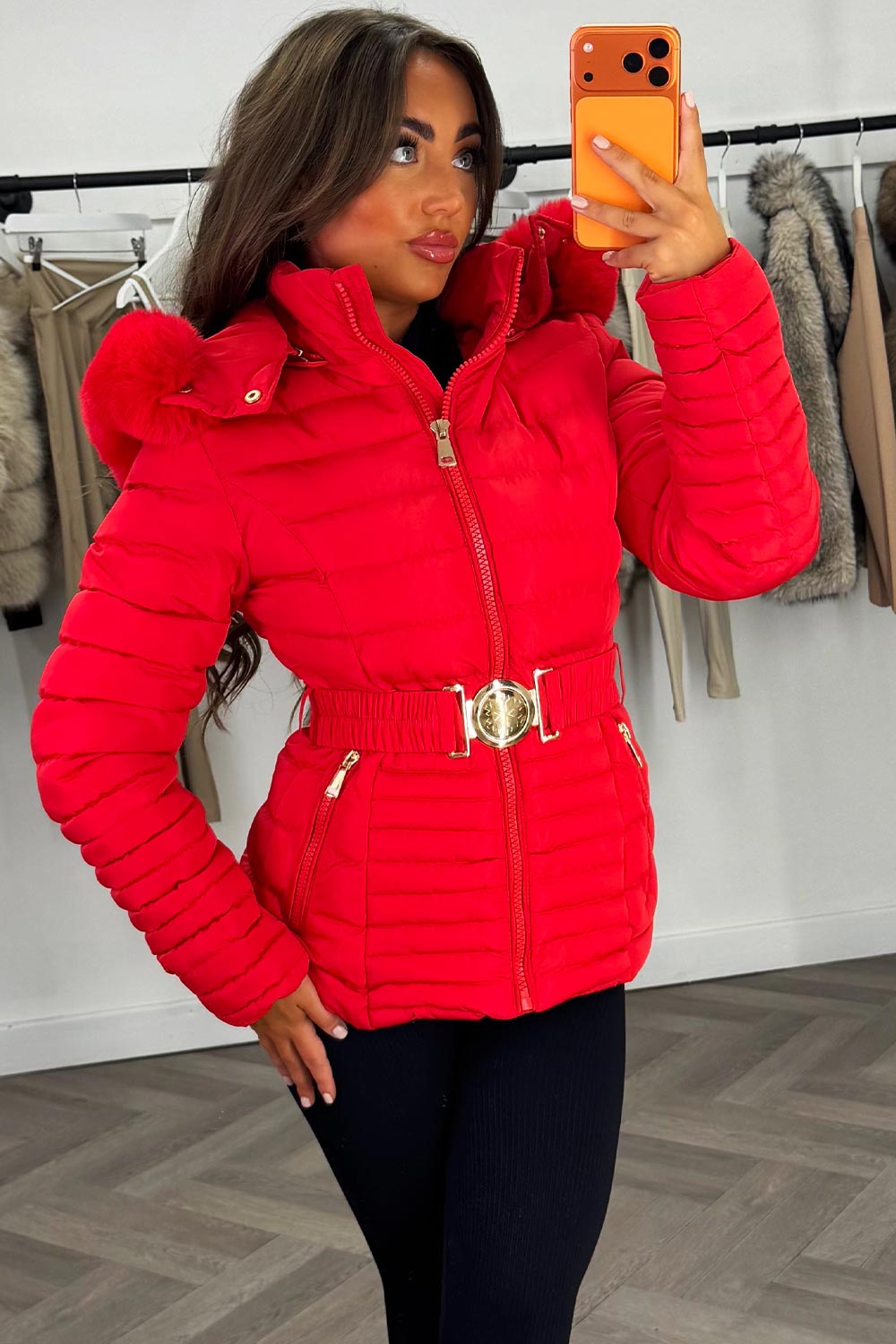 Eleanore | Women’s belted puffer jacket with faux fur hood