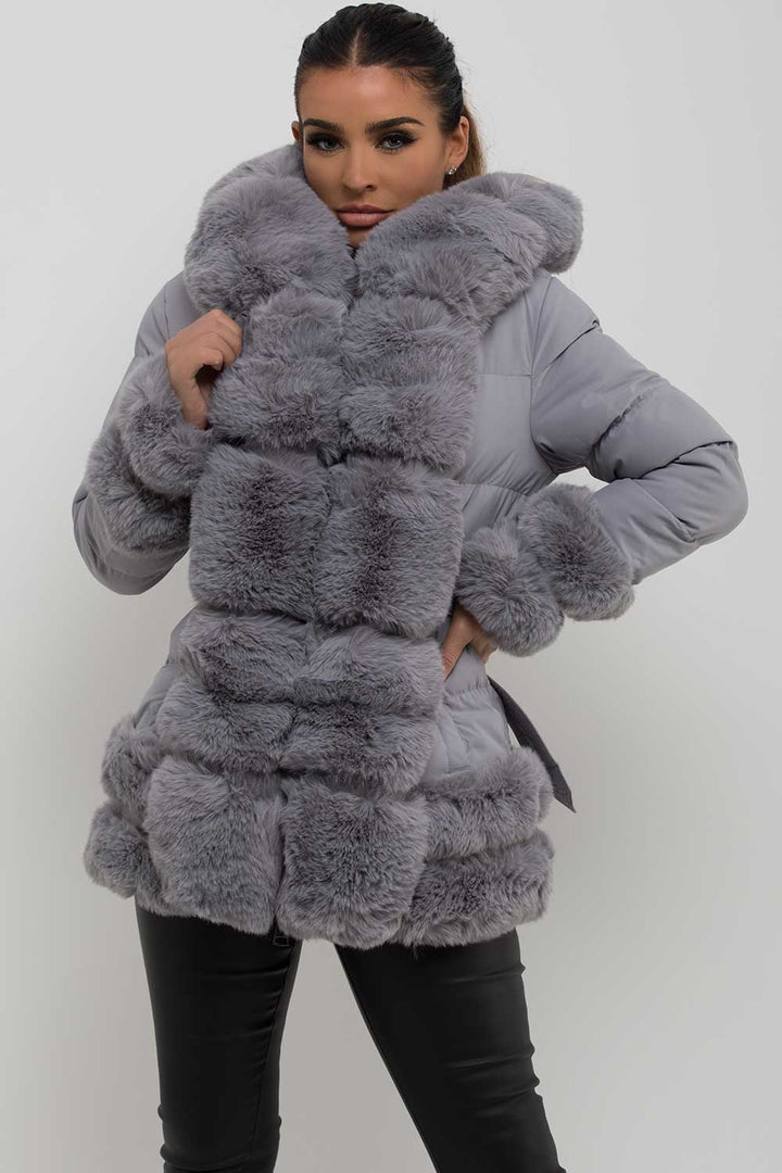 Kiana |  Women’s faux fur trim hooded puffer jacket with belt