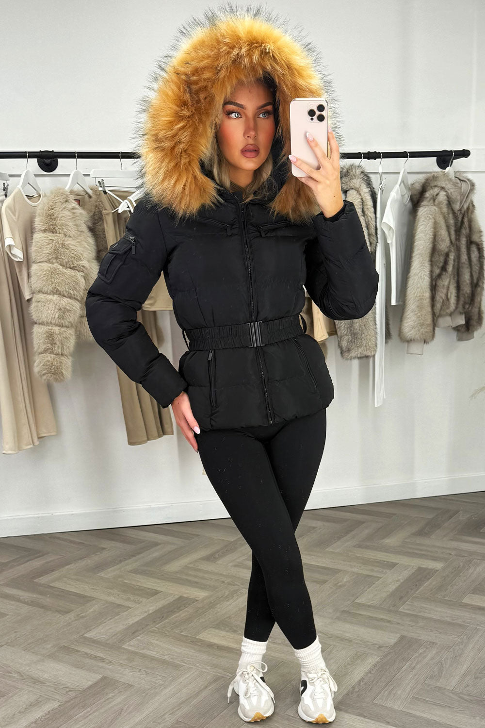 Ameliee | Women’s belted puffer jacket with faux fur hood