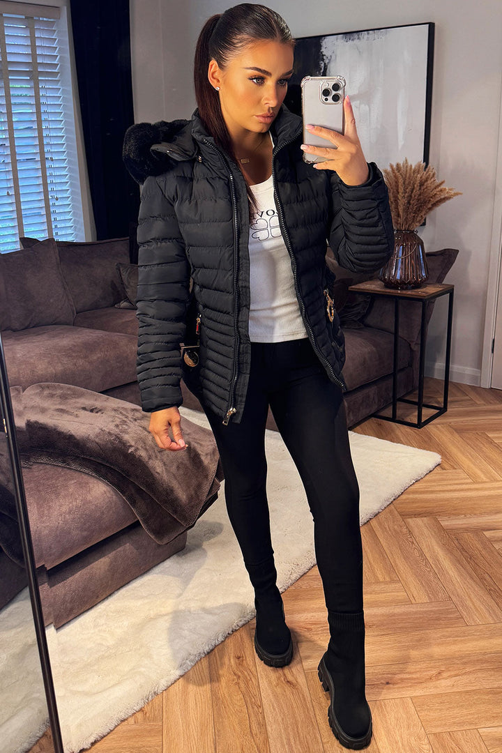 Kahlani | Women’s padded puffer jacket with faux fur hood and belt