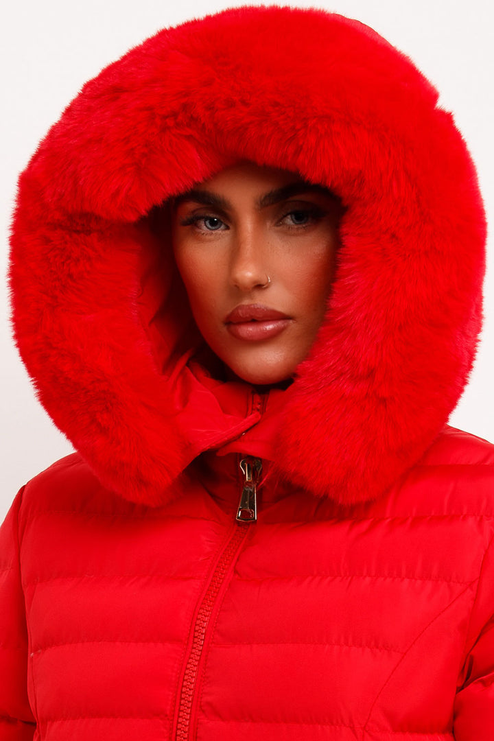 Eleanore | Women’s belted puffer jacket with faux fur hood