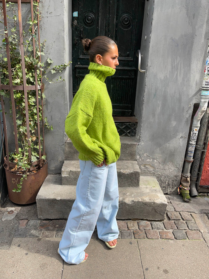 Kate | Women’s green turtleneck sweater with ribbed details and sleek silhouette