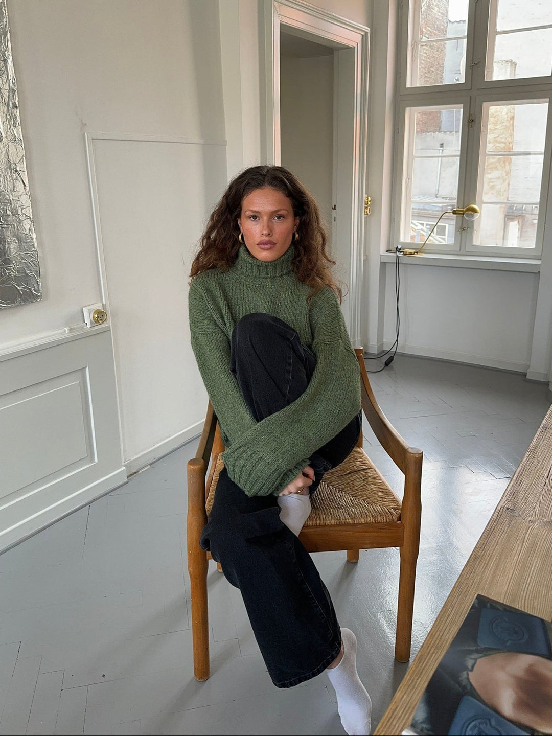 Kris | Women’s green turtleneck sweater with ribbed details and sleek silhouette