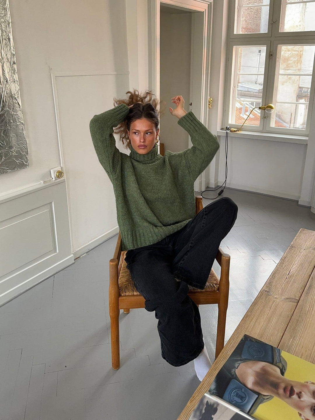 Kris | Women’s green turtleneck sweater with ribbed details and sleek silhouette