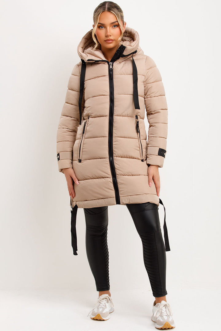 Joelle | Women’s long hooded puffer coat with side strap detail